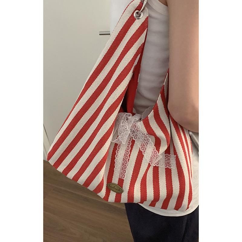 

New Korean striped canvas bag women s summer 2025 new niche tote bag student large-capacity cloth bag