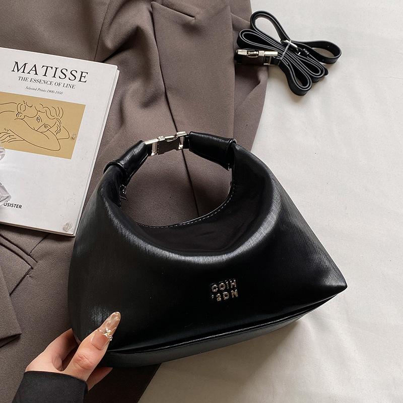 Korean version of fashionable simple high-quality textured wrist dumpling bag niche casual versatile commuter messenger crescent bag women