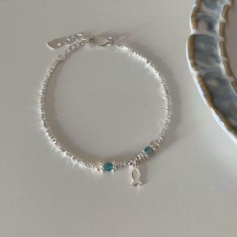 

Браслет из синего кристалла и серебряной рыбки: Элегантный женский модный браслет