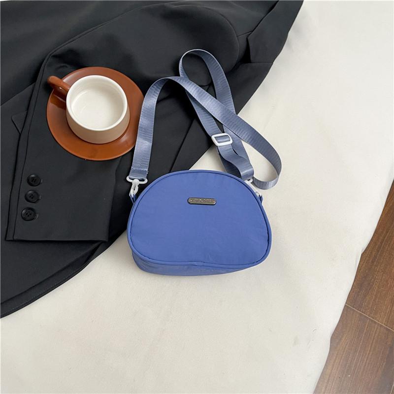 New large-capacity simple commuter casual solid color portable shoulder bag light cloth bag wide shoulder strap messenger bag women's bag