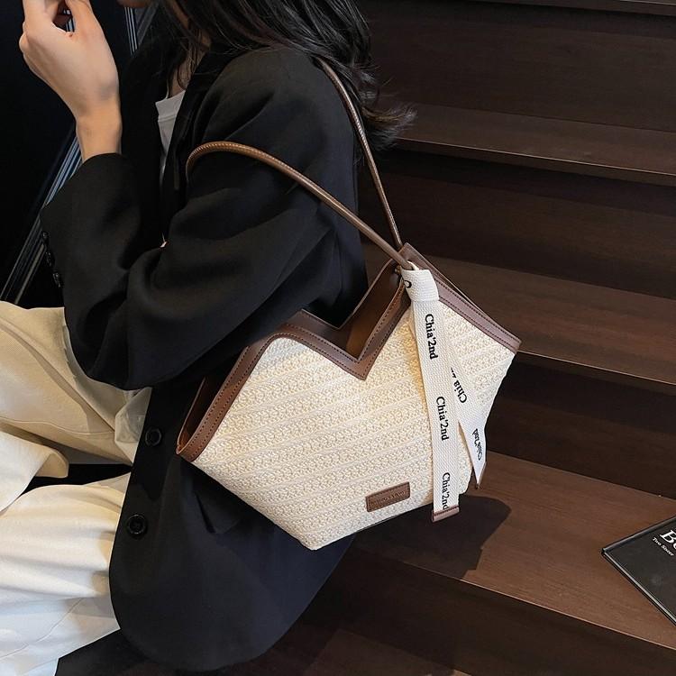 Große gewebte Strohtasche Damen Frühling und Sommer 2025 neu Nische Single Shoulder Strandurlaub Strand Tragetasche