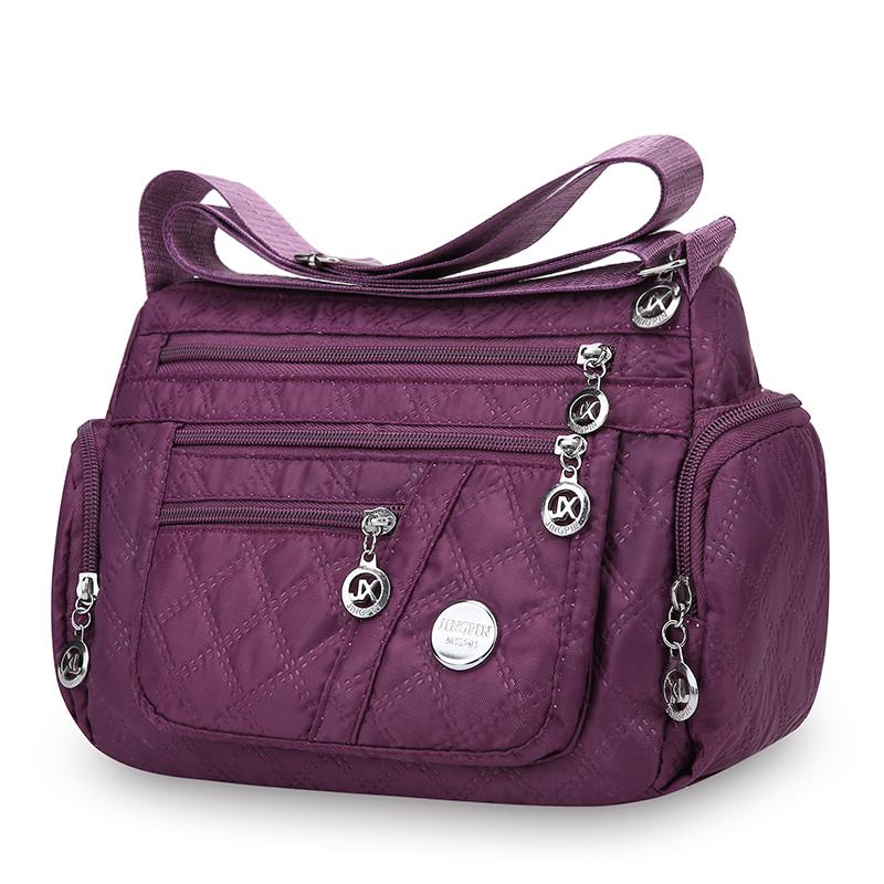 

Сумка женская большая вместительная сумка через плечо водонепроницаемая и износостойкая многокарманная сумка для поездок на работу и отдыха на открытом воздухе через плечо фиолетовый