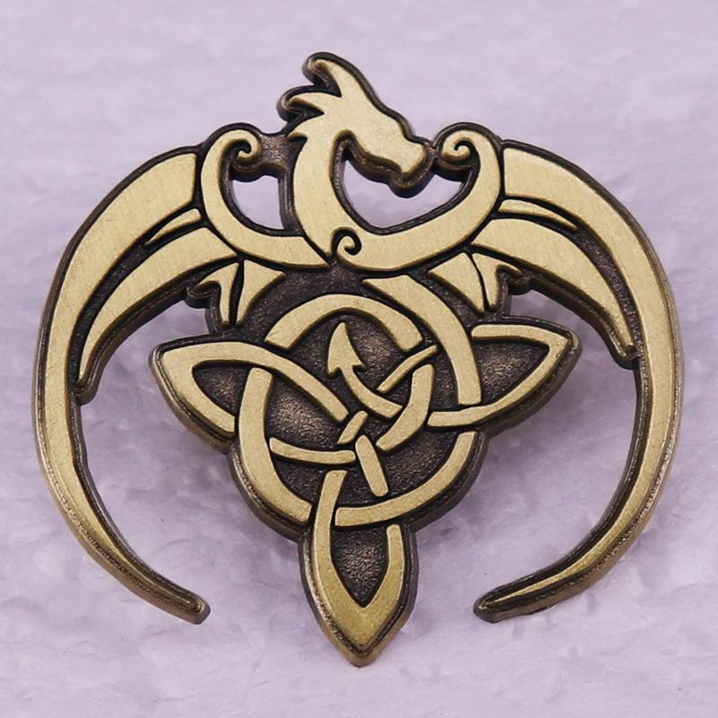 Винтажная металлическая брошь с руной дракона