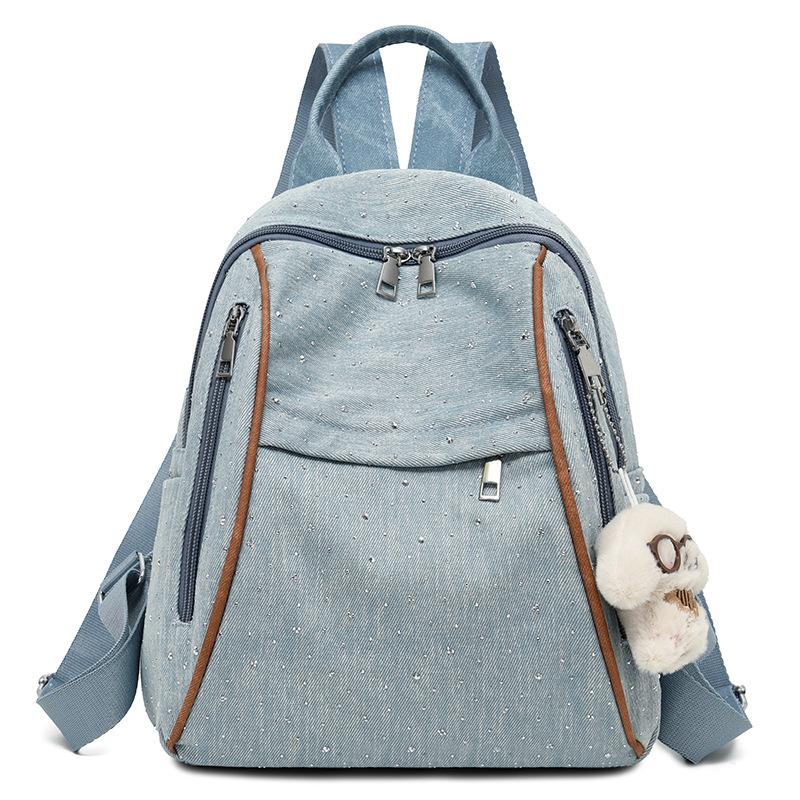 

Denim Style Backpack with Multiple Zipper Compartments and Top Handle светло-синий