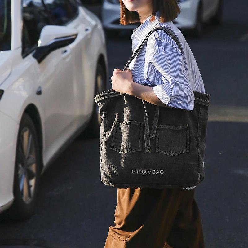 Stylish Denim Tote Bag for Women – Classic Jeans Design with Front Pockets and Embroidered Logo, Perfect for Casual Use