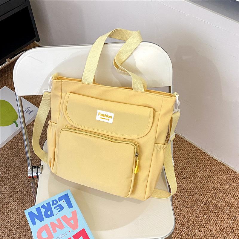 

Ученики средней школы Ученики старшей школы Большая вместимость наплечная сумка Сумка через плечо Простая и свежая нейлоновая сумочка one size fits all жёлтый