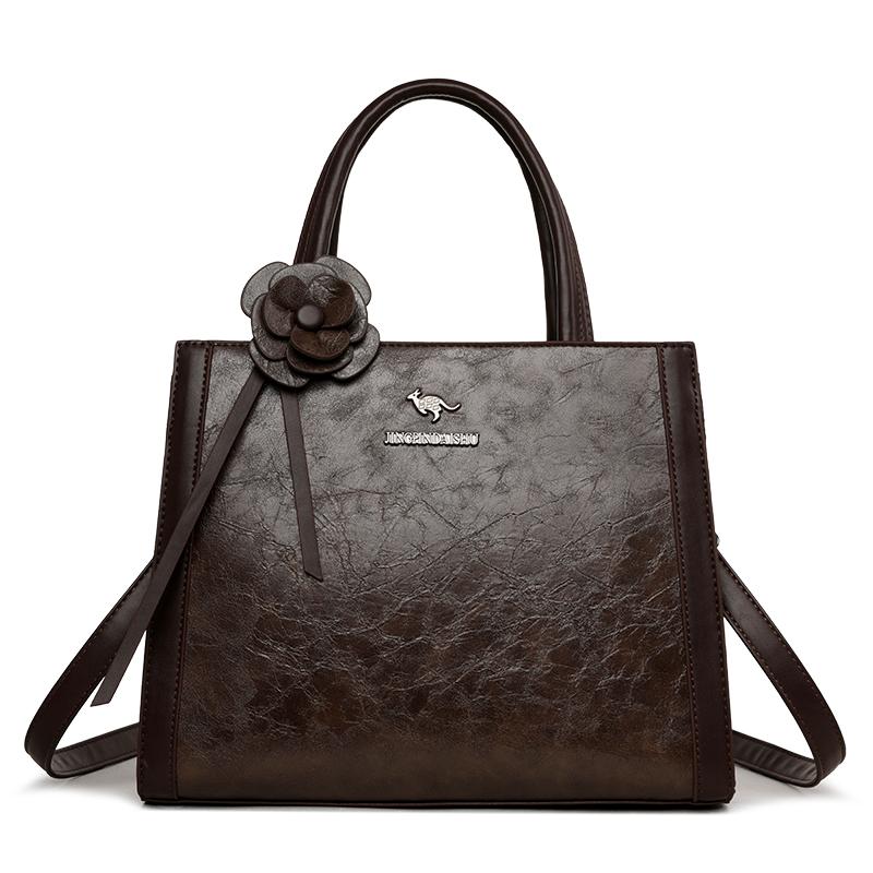 Elegant Faux Leather Tote Bag with Flower Decoration and Adjustable Shoulder Strap