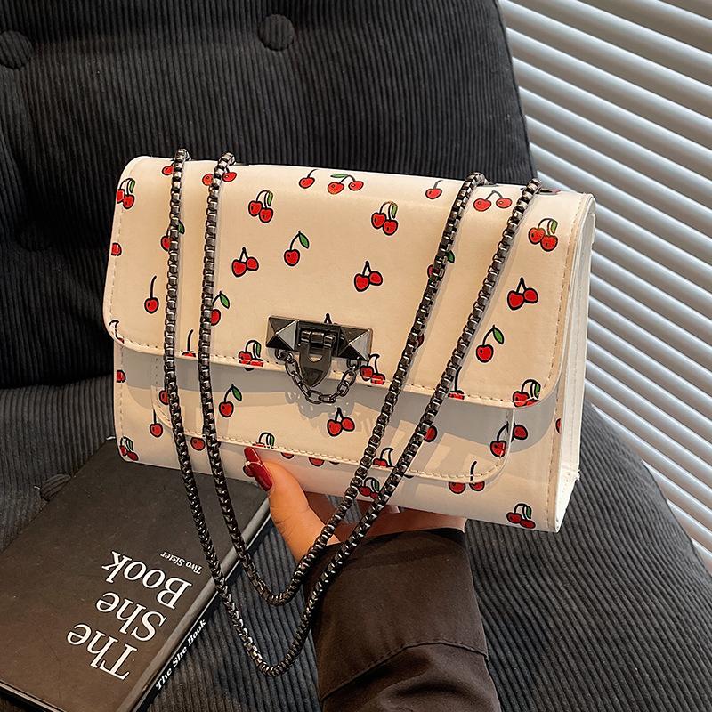 

Fresh and casual fashion saddle bag women s 2025 new autumn cute strawberry shoulder bag Korean version fashion messenger bag