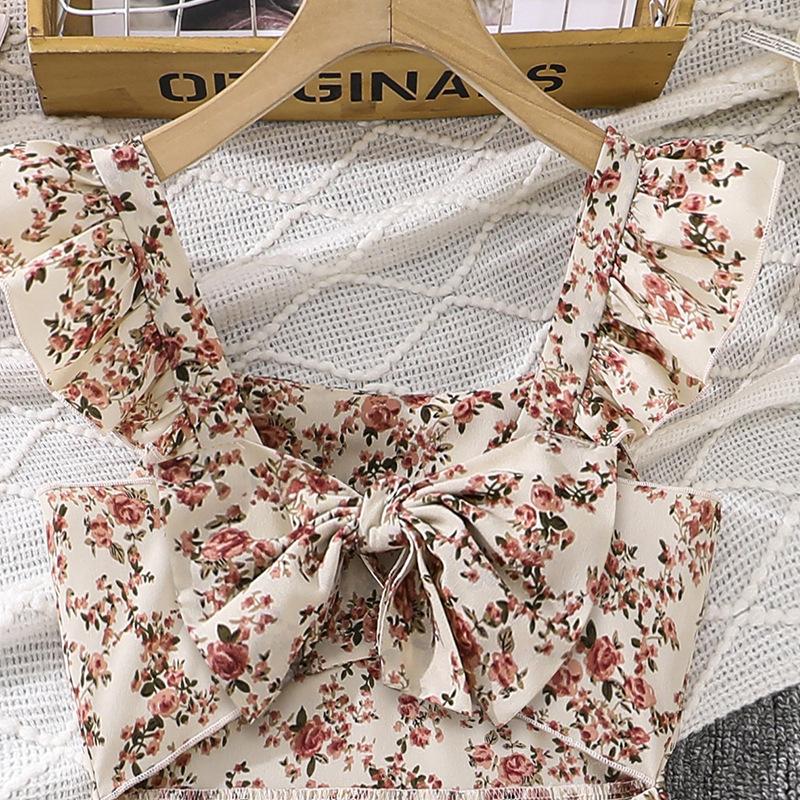 Modna Sukienka dla Dziewczynki Letnia Dziecięca Elegancka Kwiatowa Falbankowa Na Cienkich Ramiączkach z Kokardą