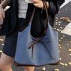 Retro commuter niche bow single shoulder armpit bag new fashionable and simple contrasting color tote bag