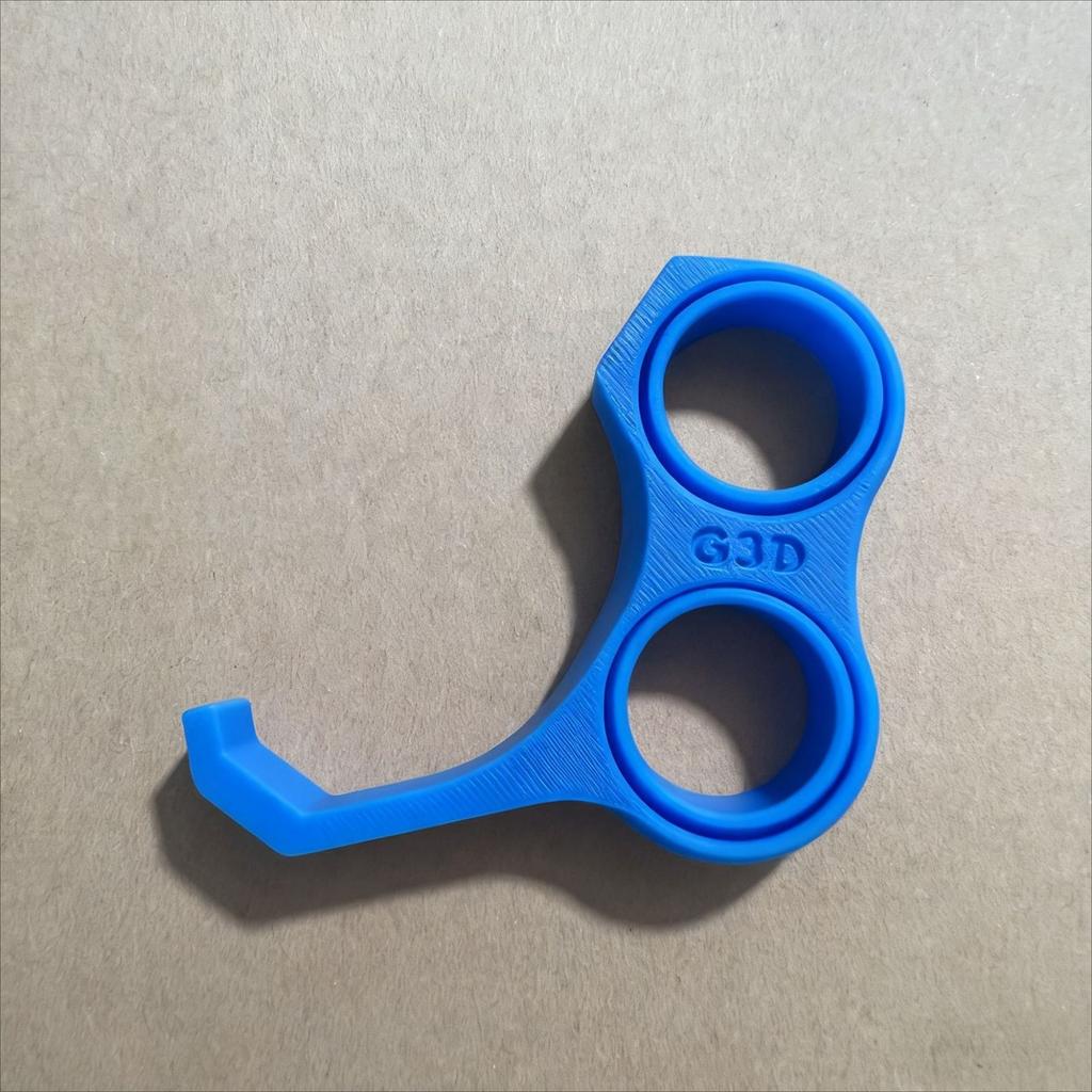 Multi-functional Ergonomic Phone Grip Stand And Stress-relief Toy Integrated Holder.