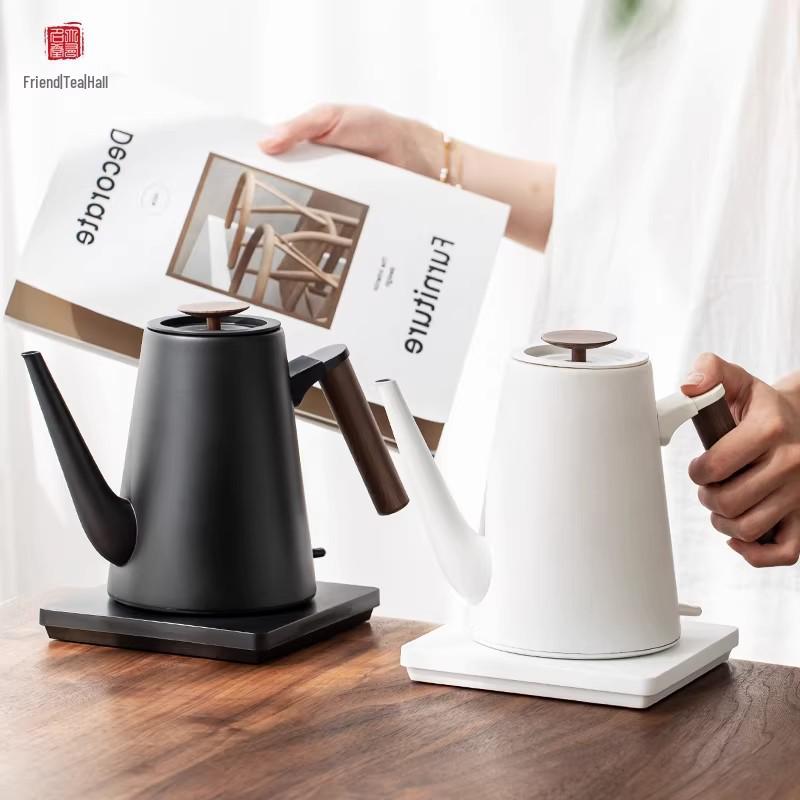 Youmingtang Black & White Electric Kettle: Fast Boiling for Home, Tea Brewing, Water Heating, and Hotel Use.