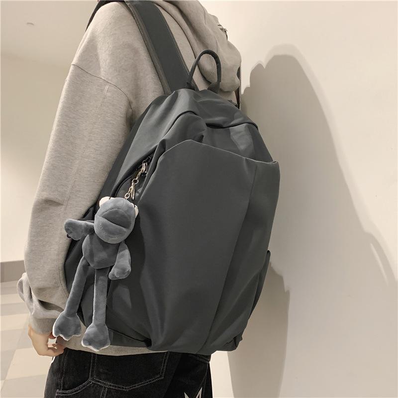 Schoolbag schoolbag female college student simple ins trendy cool large capacity backpack Korean version solid color light leisure travel backpack