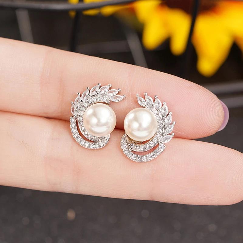 

Gift New Design Swan Tail Imitation Pearl Earrings for Women Elegant Geometric Zircon Fashionable Temperament