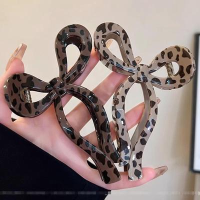 Leopardenmuster Acryl-Krallenclip: Hochwertiges Schleifen-Haaraccessoire für Damen
