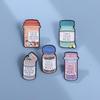 Cartoon Medicine Bottle Alloy Brooch: European & American Style Enamel Badge for Clothes & Bags