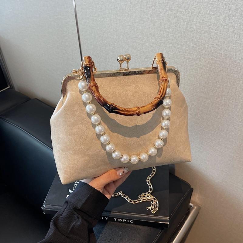 Spring and summer retro small bag women's new fashion bamboo joint portable mouth gold bag pearl chain messenger bag