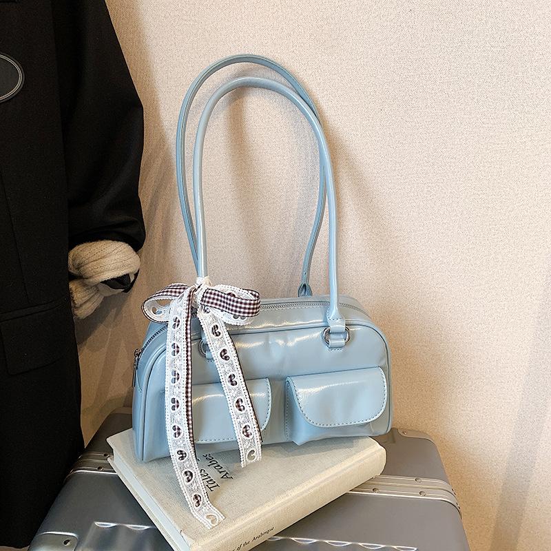 

2025 new solid color retro PU women s bag shoulder bag, this year s popular large-capacity bowling bag oil wax leather women s bag 28*8*15