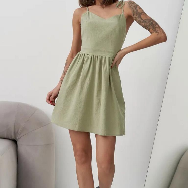 2025 Elegant Women's V-neck Backless Spaghetti Strap Dress with Lace-up Detailing.
