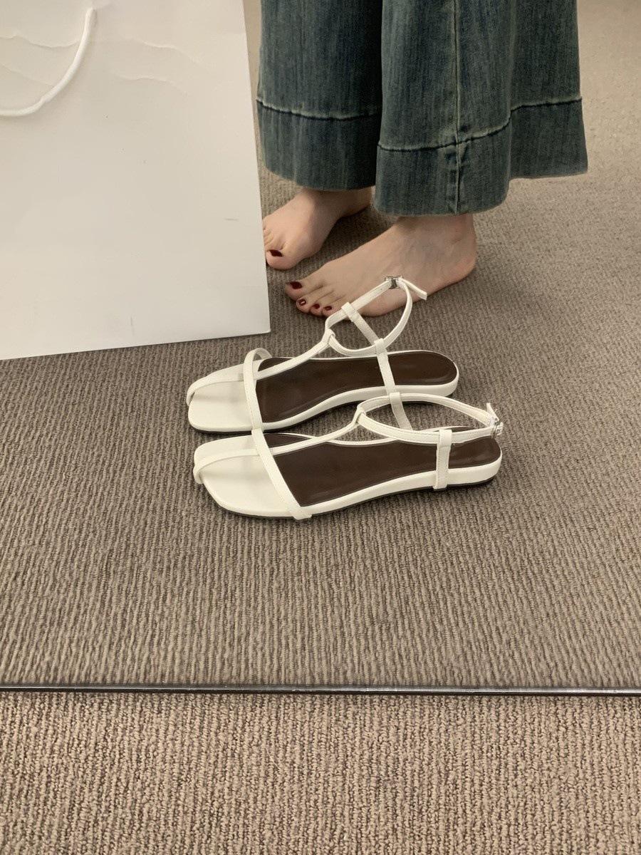 

French flat-bottomed cross with open-toed sandals female summer skirt fairy wind slope heel casual beach Roman shoes 40