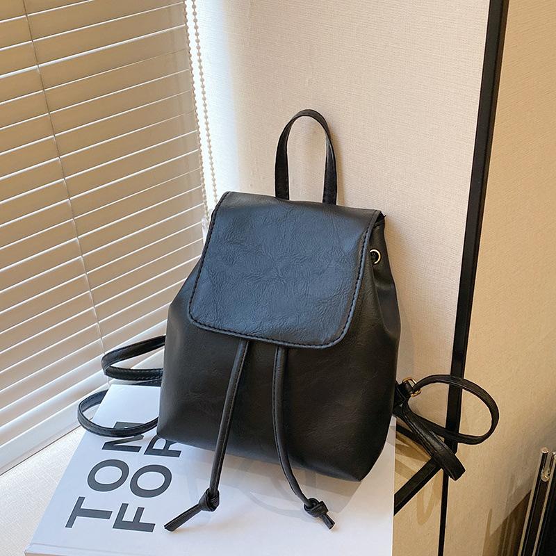 

Small retro brown backpack women s 2025 spring and summer new simple literary versatile shoulder drawstring shoulder bag чорний