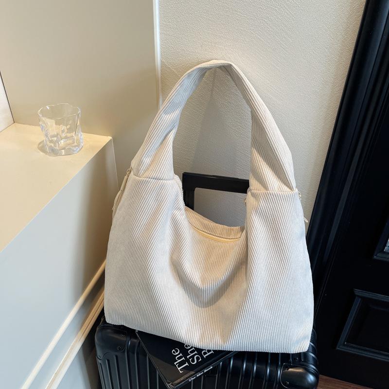 Large capacity corduroy shoulder women's bag bag 2025 new solid color bucket bag casual Korean version armpit bag
