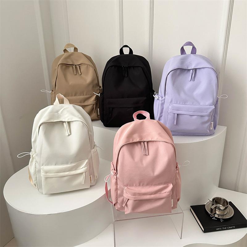 New solid color large-capacity simple casual Oxford cloth student class schoolbag men's and women's casual backpack