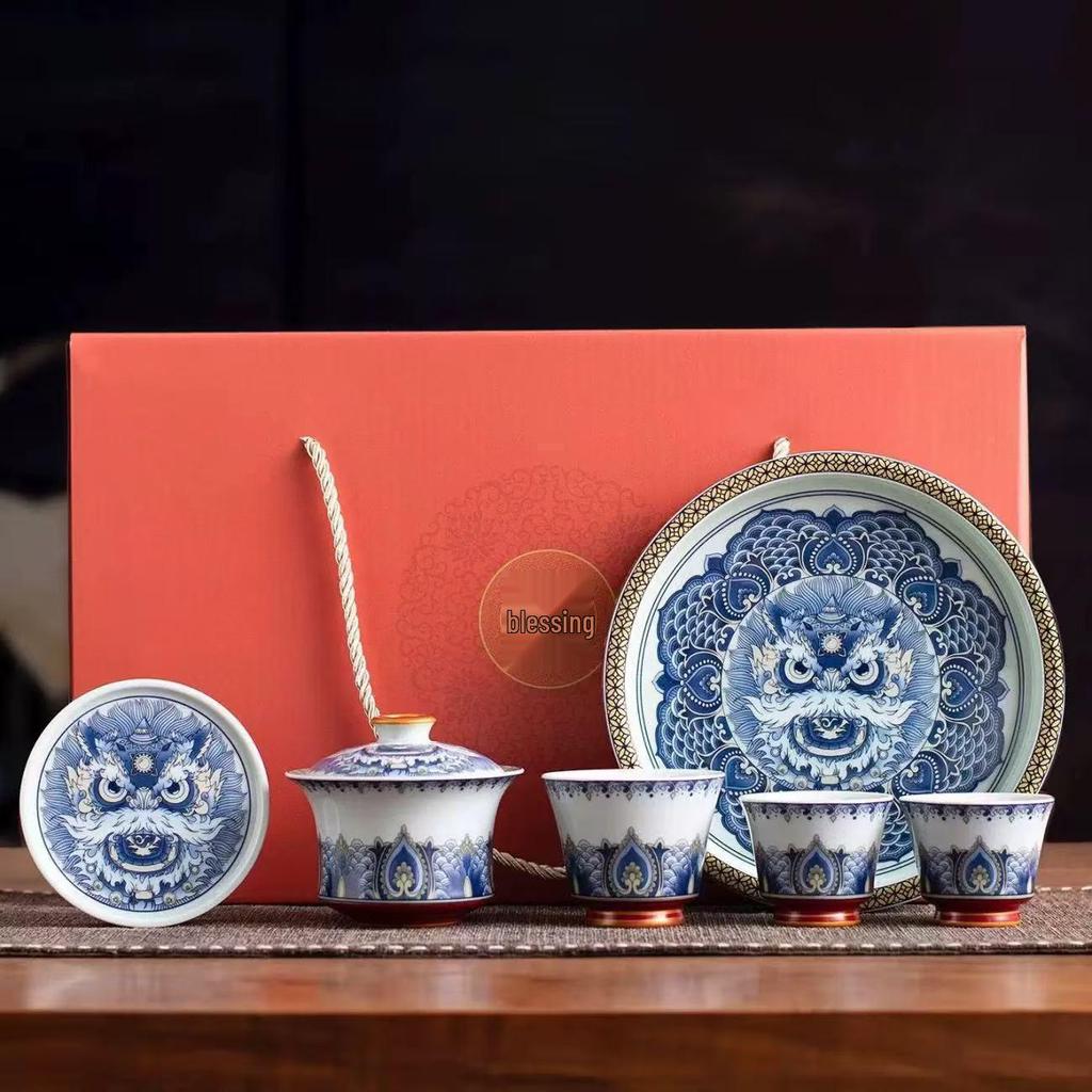 Blue and White Porcelain Lotus Kung Fu Tea Set: Enamel Teacup, Hovering Lid, Teapot, Saucer, and Master Cup.