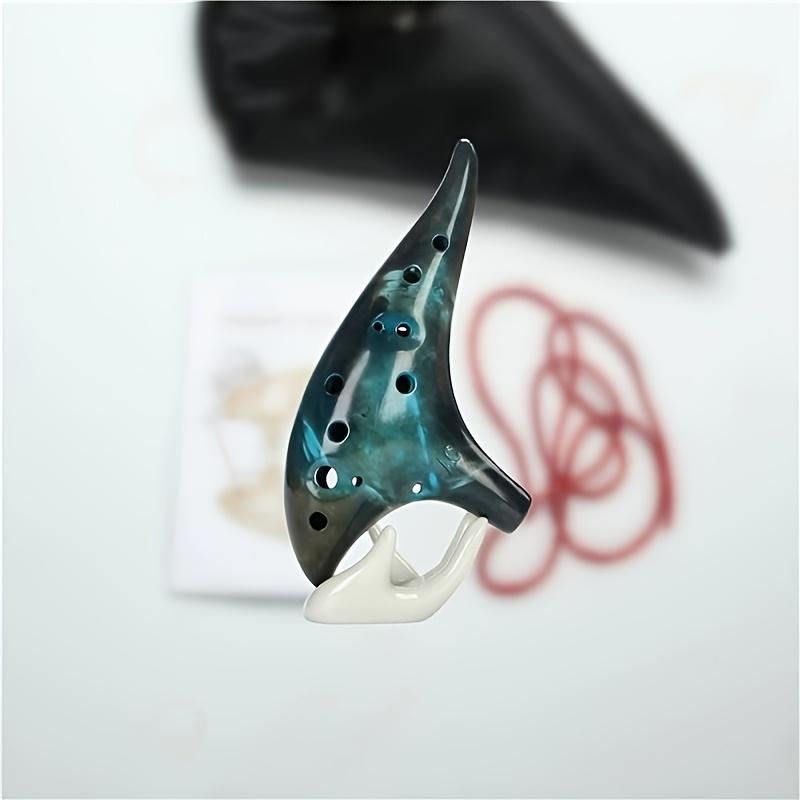 

Керамическая окарина-флейта с 12 отверстиями в строе альт до - Красновато-коричневая глянцевая отделка с нотами, мундштук в форме звезды, идеально подходит для праздничных случаев