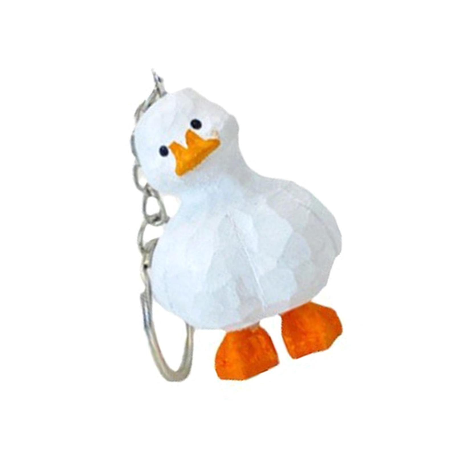 

Прекрасный брелок для ключей из прочного дерева в форме уточки. Уникальный аксессуар ручной работы. Модный аксессуар для ключей. Практичные материалы. Для ежедневного использования. 1