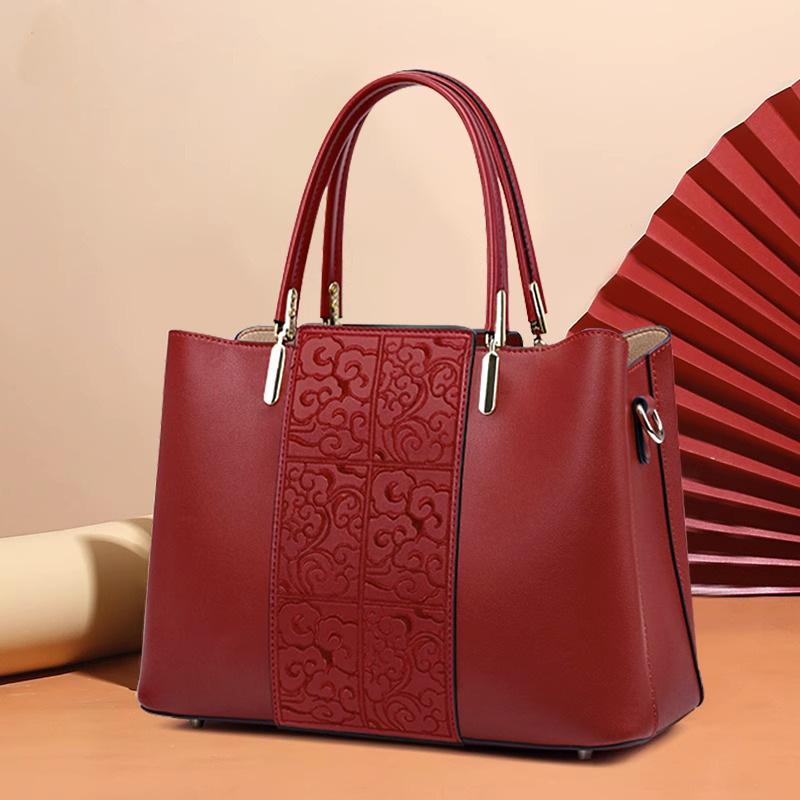 Mom's Wedding Bag, A Red Bride's Bag, Exudes A Sense of Luxury. Middle-aged Happy Grandma's Wedding Handbag