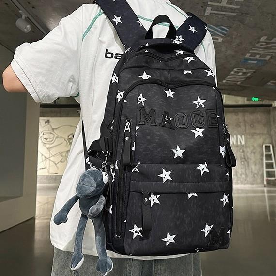 Schoolbag wholesale Korean version of large-capacity schoolbag boys junior high school backpack trendy cool stars versatile travel spine weight