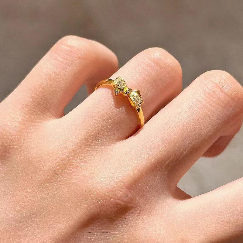 Inlaid Cubic Zirconia Bow Ring for Women - Retro Light Luxury Design