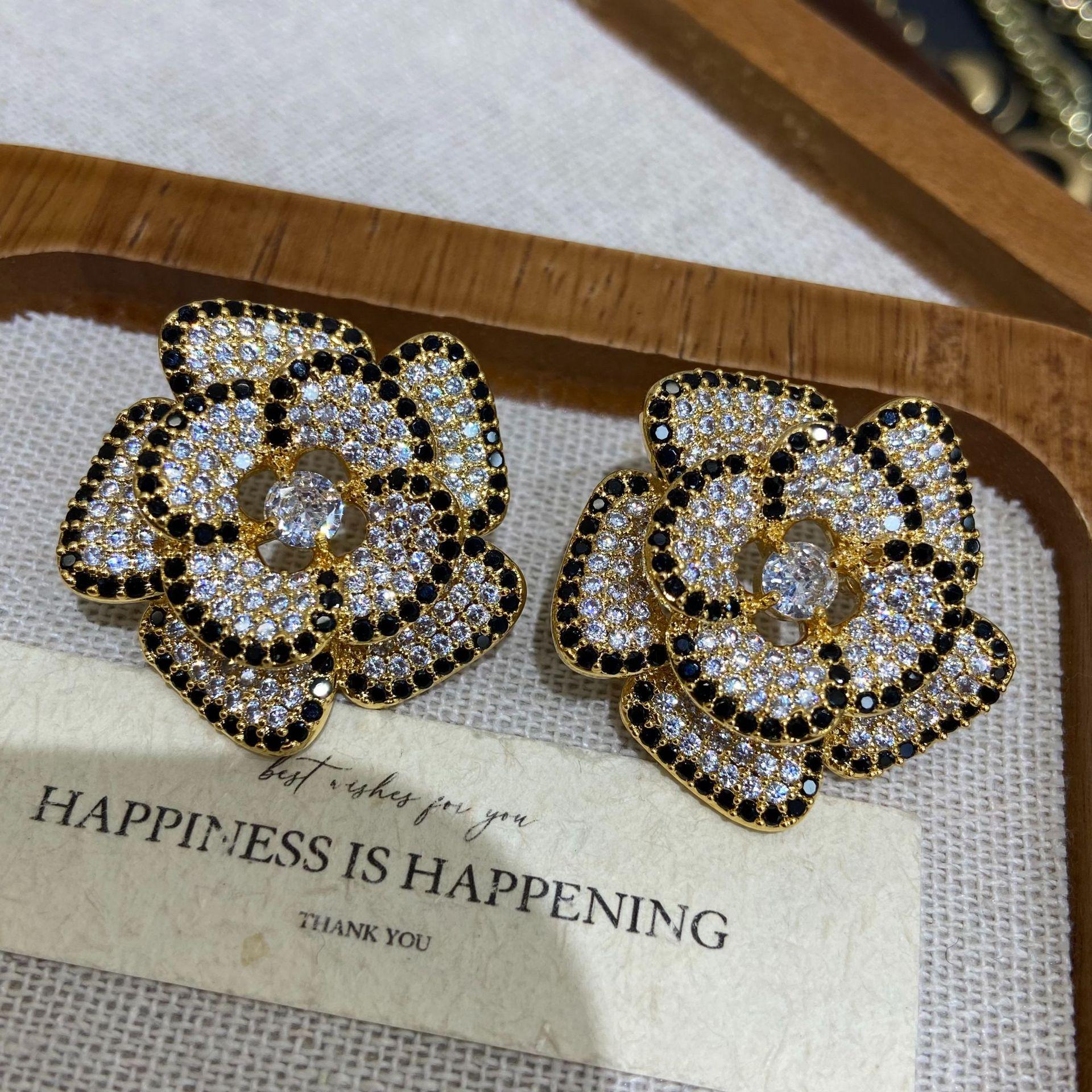 

Black Mountain Tea Exaggerated Personality Micro-Inlaid Zircon Three-Dimensional Flower Earrings Simple Versatile Earrings Premium Earrings Batch