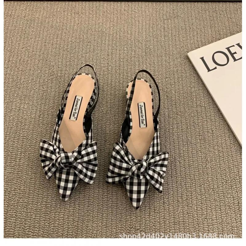 

2025 summer new French pointed head bow bag head sandals women s thick heel shoes temperament with skirt empty single shoes 40