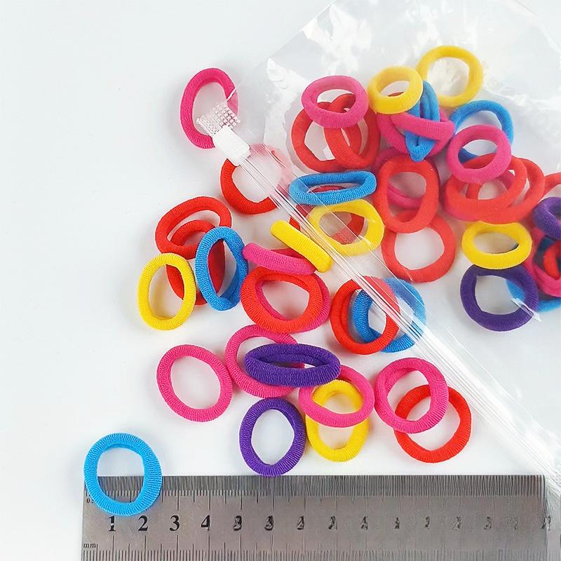 

Disposable Girls Hair TiesSmall Hair Bands Rubber Bands High Elasticity Candy-colored Small Seamless Towel Bands, Hair Bands Fluorescent color-100pcs