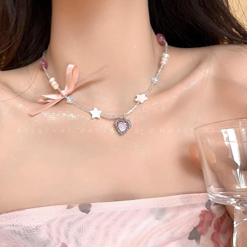 Color dopamine pearl love necklace female niche design temperament versatile bow collarbone chain beaded neck chain