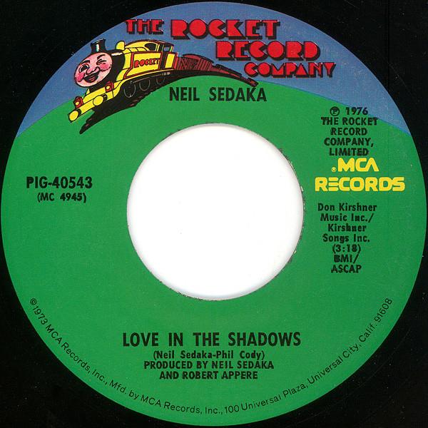 7inch Record NEIL SEDAKA - Love In The Shadows PIG40543 The Rocket Reco 1976 US Rock Used