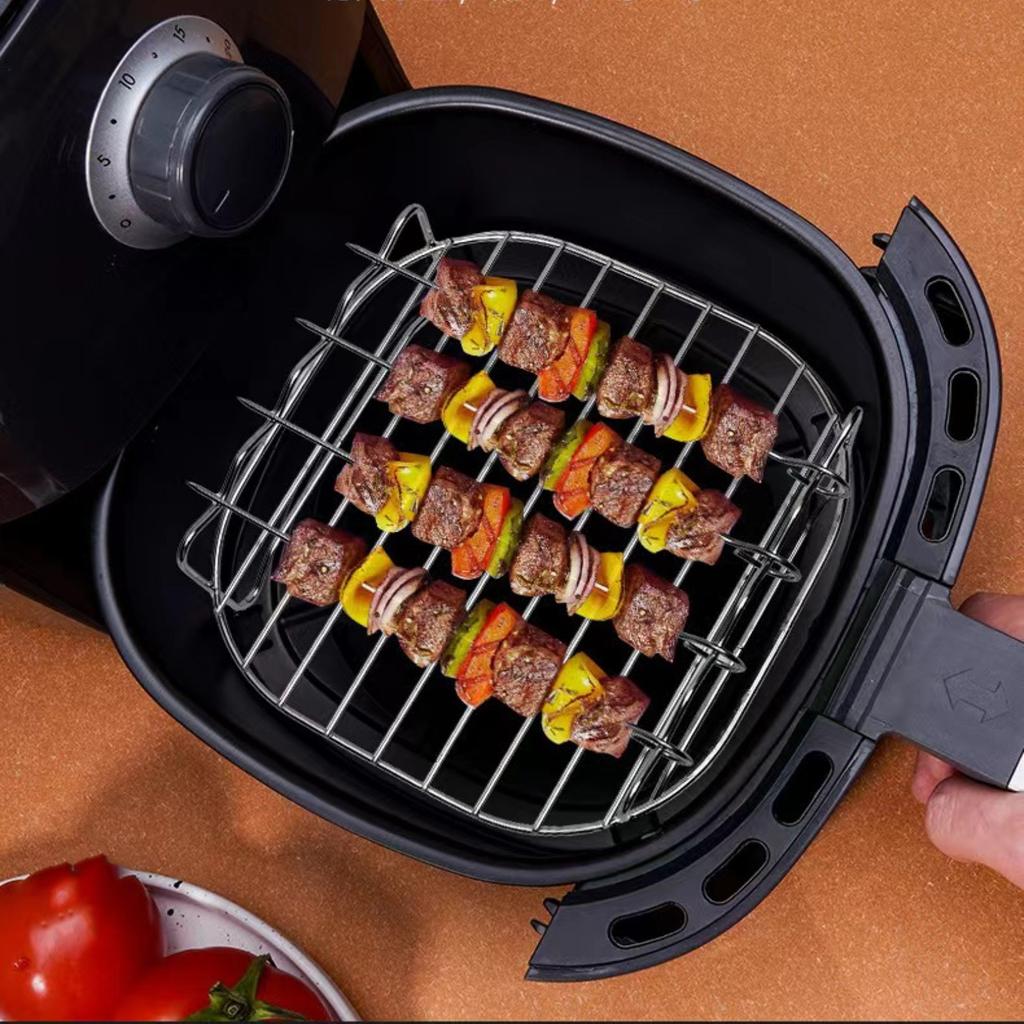 Stainless Steel Grill With Skewers And Barbecue Accessories