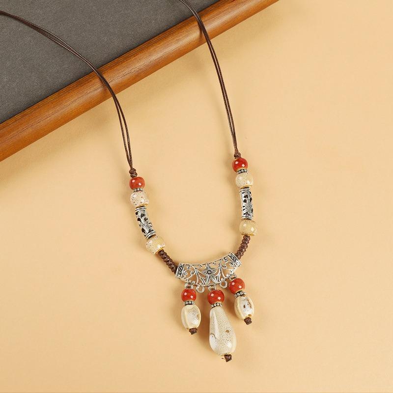 

Головной убор Экзотическое украшение на лоб Керамическая подвеска в виде капли воды для бровей Антикварная тибетская цепочка на лоб Ожерелье-украшение Женщины