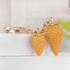 Rhinestone Strawberry Keychain: Cute Fruit Bag Charm & Light Luxury Metal Pendant for Women’s Car Keys