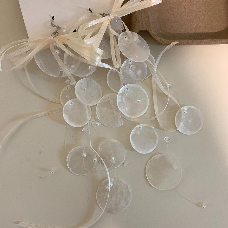 

Серьги-кисточки с диском-стримером в виде банта, темпераментные, универсальные, на крючках, модные, легкая роскошь, высококлассные