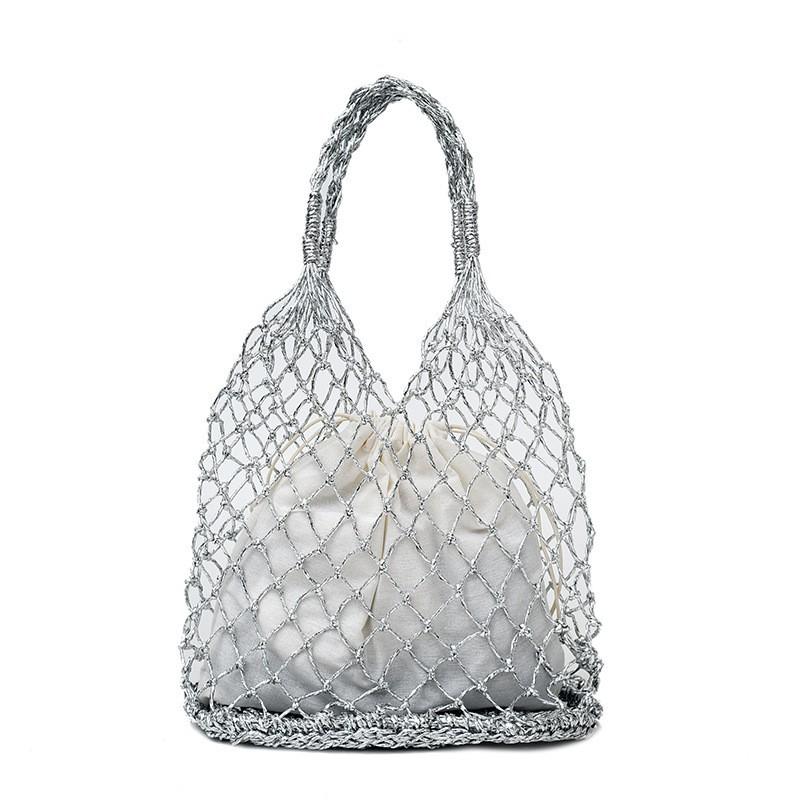 Hand-woven Bag Women 2025ins Wind Fishing Net Hollow Handbag Niche Travel Beach