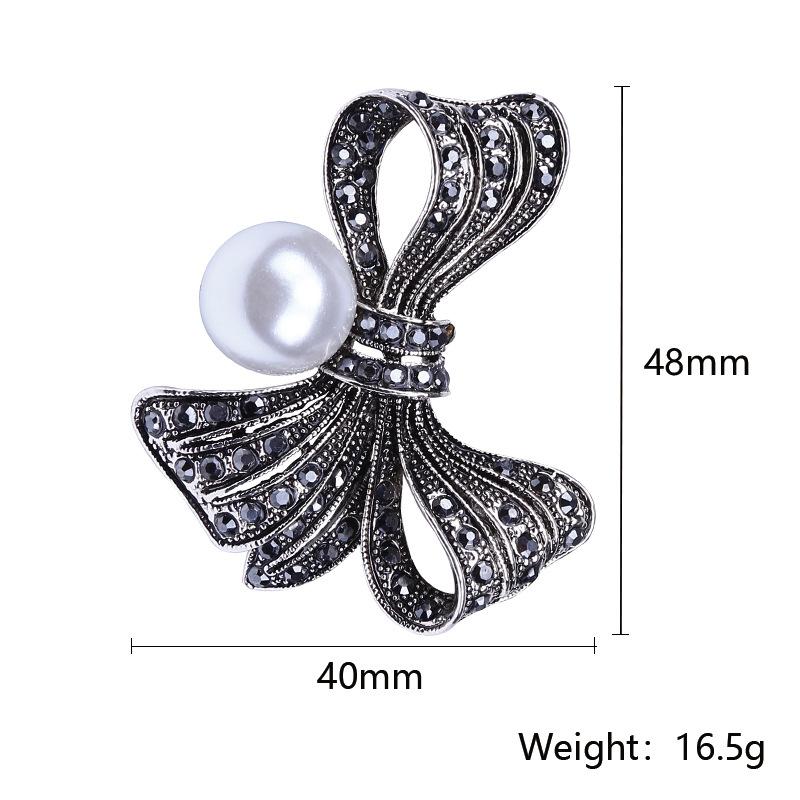 Enkel retrolegering rhinestone buebrosje Utsøkt allsidig dameklær Corsage smykkernål