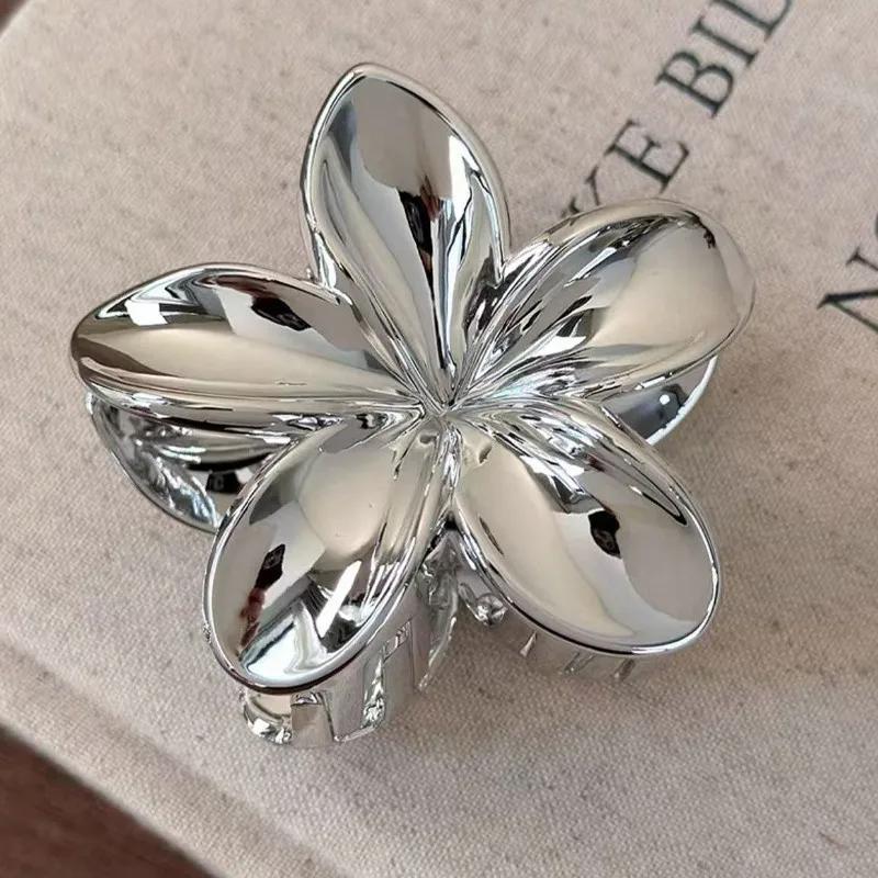 

Simple Gold and Silver Plumeria Hair Clip for Women Elegant Temperament Shiny Shark Clip Fashionable Girl Ponytail Hair Clamp Plastic