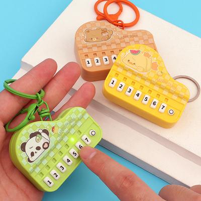Mini Piano Toy Keychain with Light 7 Keys Cartoon Animal Handheld Electronic Keyboard Musical Instrument Key Ring Holder Pendant Kids Gift