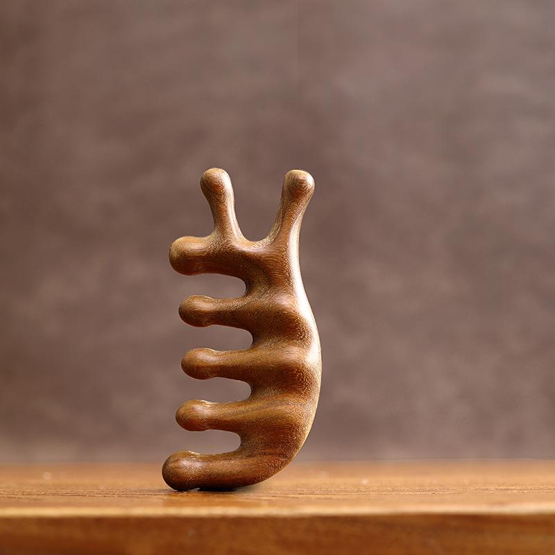 

Семизбровая расческа для меридианного массажа из зеленого сандала