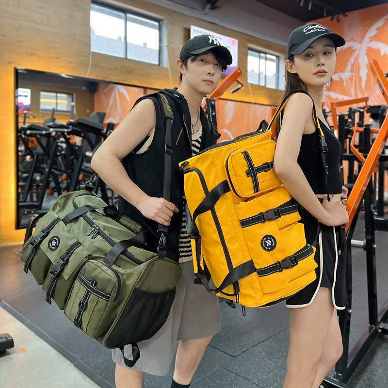 Double shoulder travel bag, large-capacity luggage bag, men and women travelon business trips, live on campus sports can set trolley case boarding bag