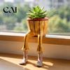 Fioriera Decorativa Seduta a Forma Umana in Resina, Fioriera Creativa con Gambe, Gambuta per Vaso Pianta Piccola da Interno, Succulente e Piante da Casa