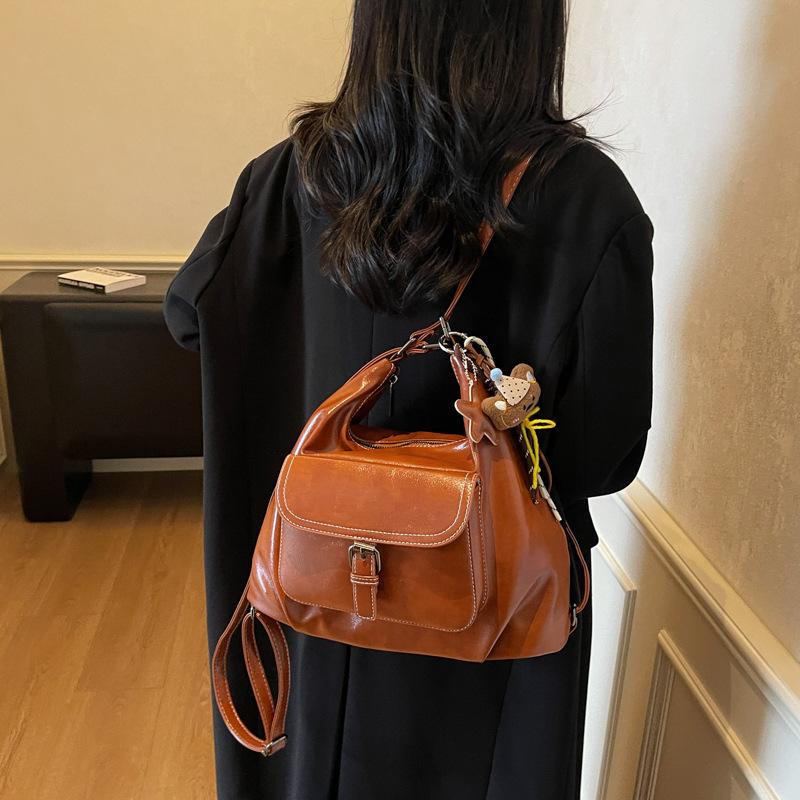 Casual large capacity retro bag women 2025 new versatile shoulder bag double shoulder backpack commuter bucket bag